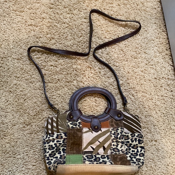 Fossil Handbags - Fossil small womens purse with cheetah print material. Removable leather strap.